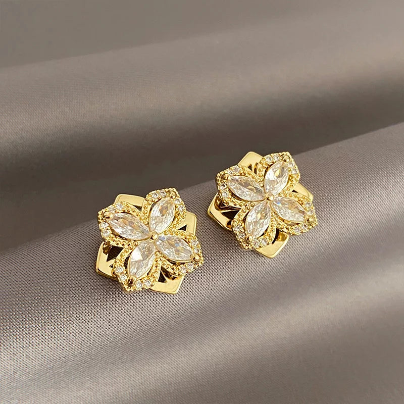 Aretes Flor Imperial Giratoria